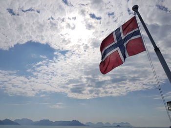 Low angle view of flag against sky