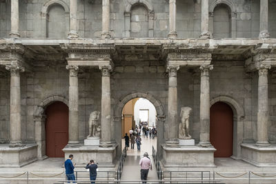 People at historic building