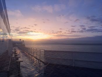 Scenic view of sea against sky at sunset