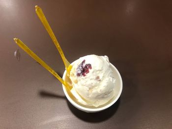 Ice cream in glass on table