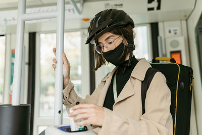 Woman working in bus