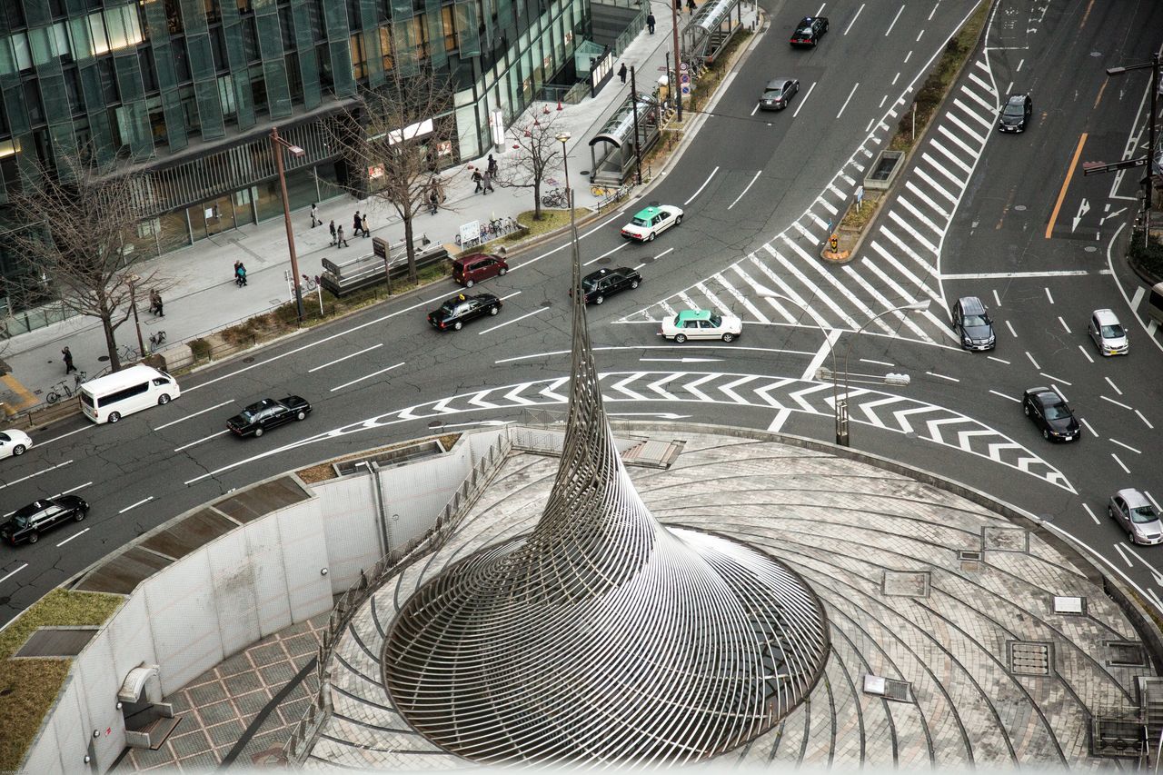 high angle view, transportation, car, outdoors, built structure, architecture, day, large group of people, people