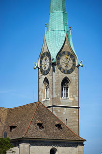 Low angle view of building against blue sky