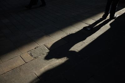 High angle view of shadow on wall