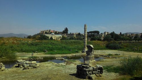 View of landscape against clear blue sky