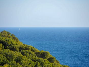 Scenic view of sea against clear sky