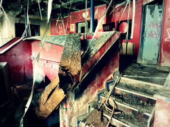 Rusty metal staircase in abandoned building