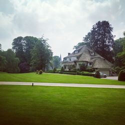 View of golf course against sky