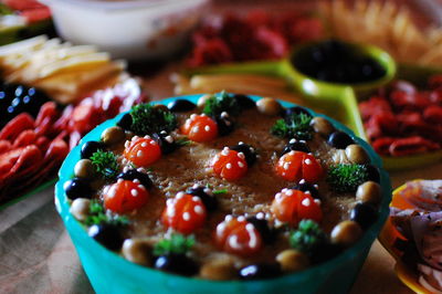 Close-up of strawberries in bowl on table