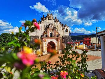 Panoramic shot of historic building against blue sky