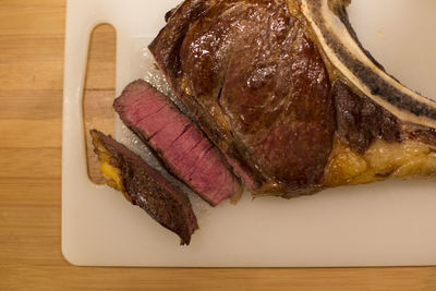 Close-up of meat in plate on table