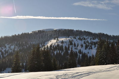 Scenic view of mountains against sky during winter