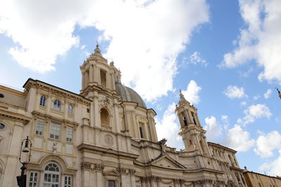 Sunny view of piazza navona with the blue sky and clouds in rome, italy