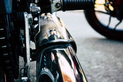 Close-up of bicycle on street