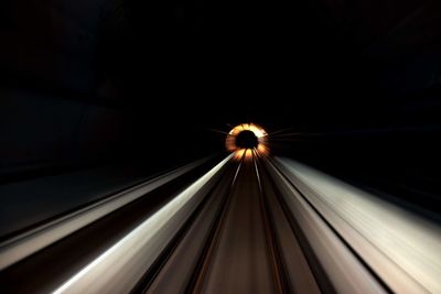 Blurred motion of illuminated tunnel