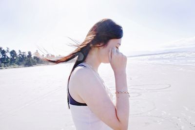Woman relaxing on beach