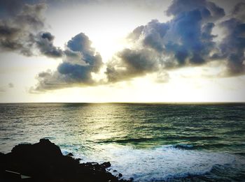 Scenic view of sea at sunset