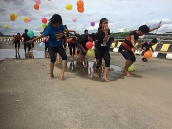 Group of people playing with ball