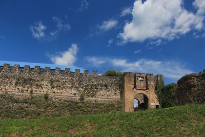 View of fort against cloudy sky