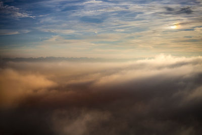 Low angle view of clouds in sky during sunset
