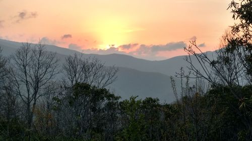 Scenic view of mountains against sky during sunset