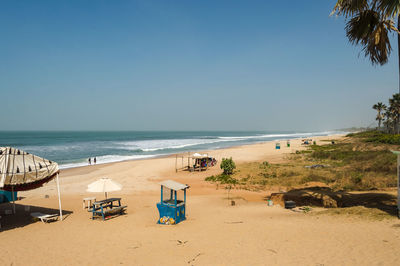 Scenic view of beach against clear sky