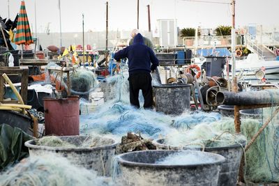 Men working on port at fishing industry