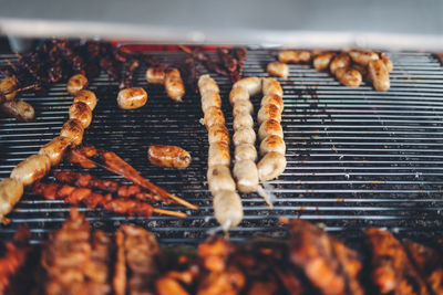 Close-up of meat on barbecue grill