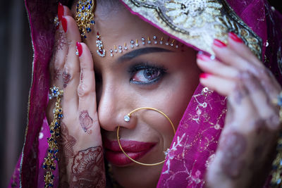 Beautiful bride wearing traditional clothing