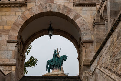 Low angle view of statue in fisherman's bastion in budapest 