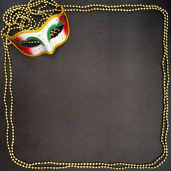 High angle view of mask on table against black background