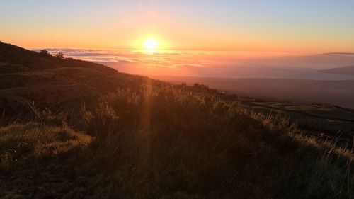 Scenic view of sunset over sea