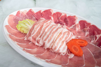 High angle view of fish in plate on table