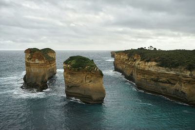 Scenic view of sea against cloudy sky