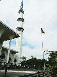 Low angle view of flag against sky