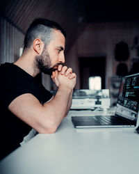 Man working on table