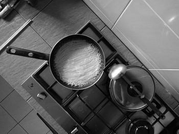 High angle view of food boiling in saucepan on stove