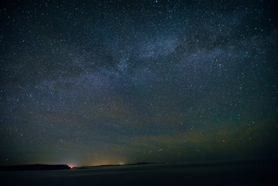 Scenic view of star field against sky at night