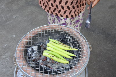 High angle view of person preparing food in basket