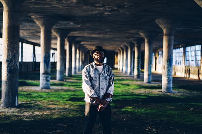 Portrait of man standing outdoors