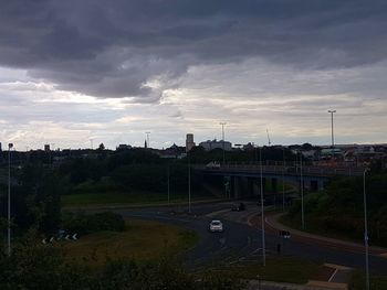 Road against cloudy sky