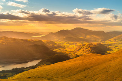 Scenic view of mountains against sky during sunset