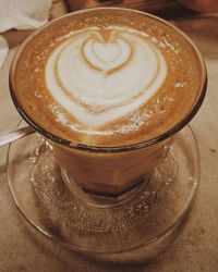 Close-up of cappuccino on table