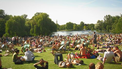 People relaxing in park