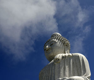 Low angle view of built structure against blue sky