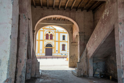 Church seen through archway
