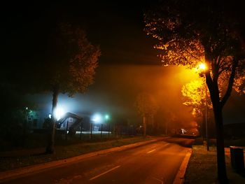 Illuminated street at night