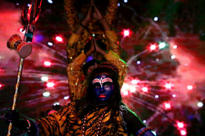 Low angle view of man with face paint