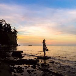 Scenic view of sea at sunset