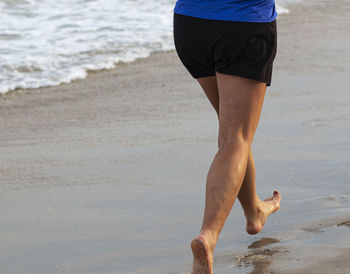 Low section of man on beach